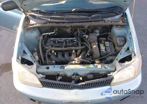 2001 Toyota Echo из США, поврежденный, VIN JTDBT123710177921